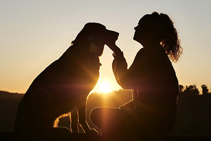 pet insurance woman holding dog