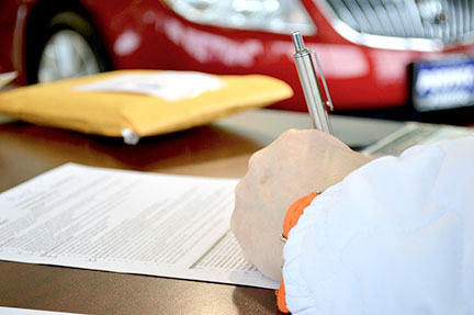 a person signing a document